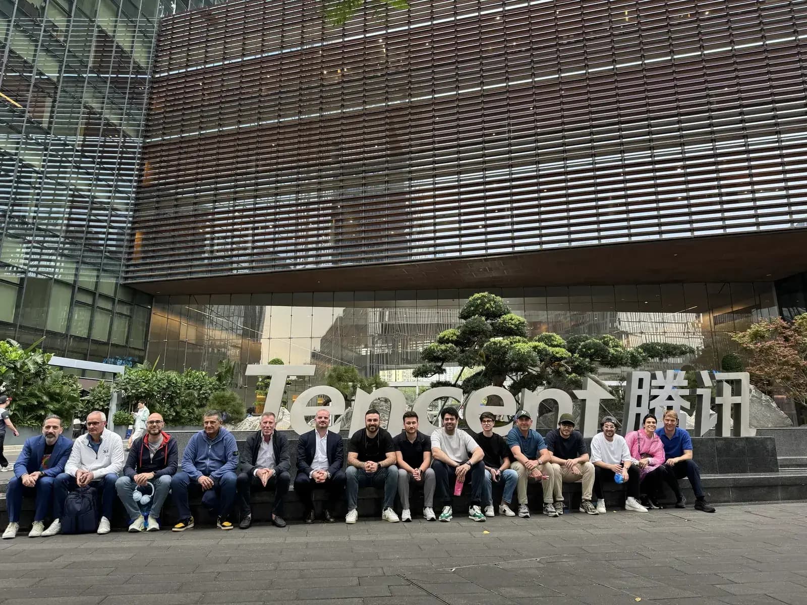 At the famous Tencent sign, in front of the Binhai Mansion in Shenzhen.