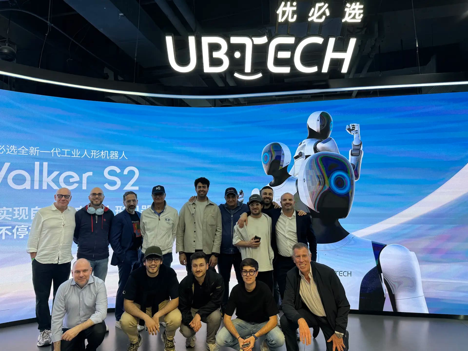 In front of UBTECH's Walker S2 — the first company in the world with a humanoid in mass production.